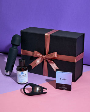 netflix and chill bundle: lana del wand, sliquid natural lubricant, batman cock ring and feel condoms